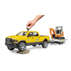 Auto Ram 2500 Power Wagen Rental Service met aanhangwagen en minibagger